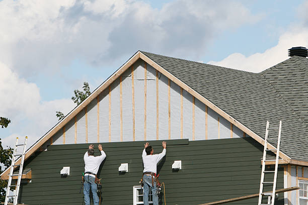 Professional Storm Damage Siding Repair technician working in Glenford, OH